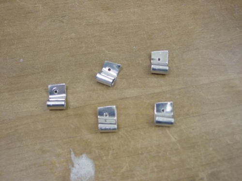 Here are the brackets i made to hold the static line.