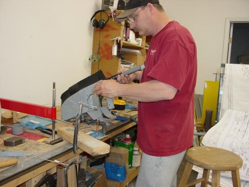 Riviting the gap seal on.