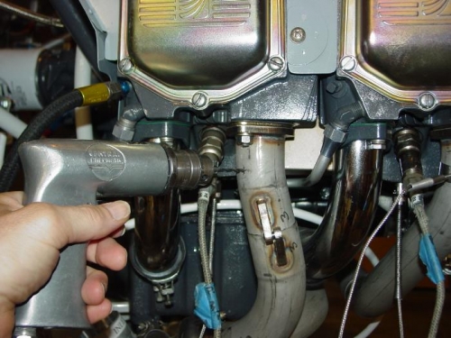 Drilling 1/8 hole for EGT lead.