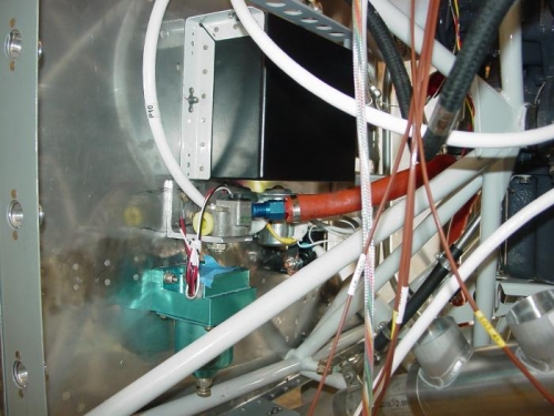 Fuelflow valve and bracket mounted to the firewall.