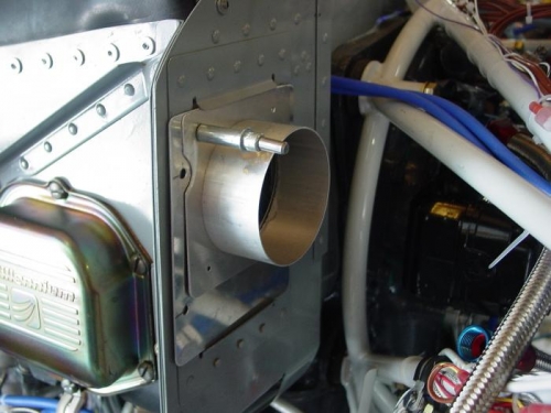 Bracket with tube to fill the hole in the back of the baffel wher the oil cooler used to be mounted.