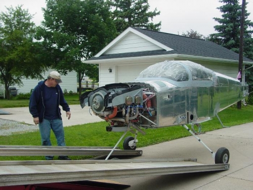 Loading onto the flatbed trailer.