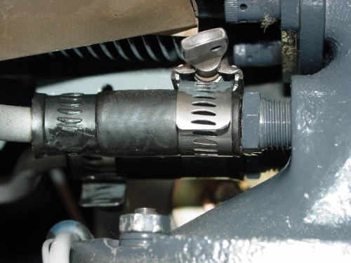 Here are the old clamps on the oil return line.