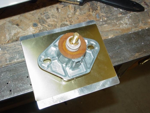 Layed out the parts to mount the external power plug.