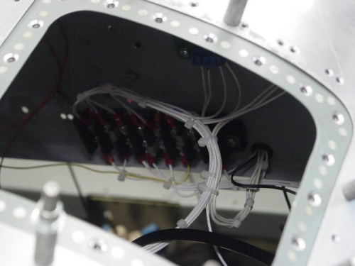 View of the wiring through the access panesl in the front deck.