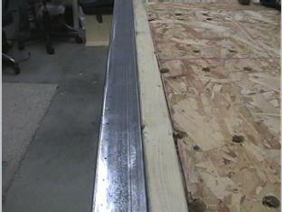 These holes will hold the trailing edge of the flaps.