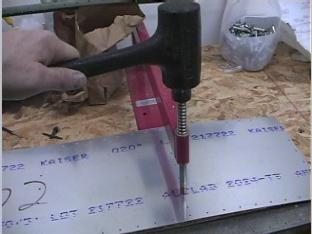 Dimpling the skins for the right flap.