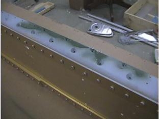 After counter sinking I put primer on the holes.