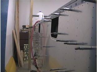 Bottom skins clecoed and drilled .