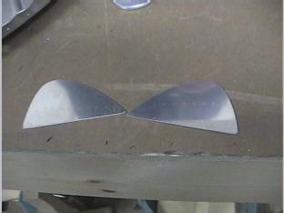 Frabricated  the T-410 nose reinforcement plates.