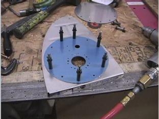 Useing the access plate to locate the holes in the rib.