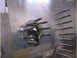 Drilling the fuel tank filler flange.