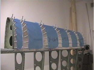 Leading edge mounted to the wing spar.