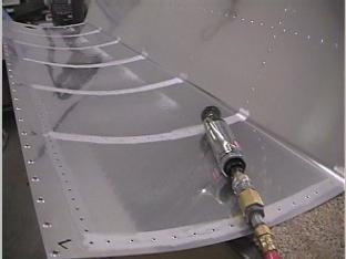 Scuffing the inside of the fuel tank for pro seal.