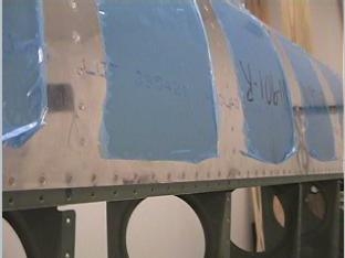 Riviting the leading edge to the main spar.