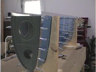 Clecoed the skins to the ribs on the leading edge.