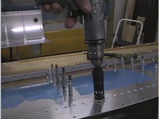 Counter sinkin the rivit holes for the backing plate.