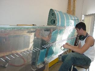 Jacob applying riviting tape.