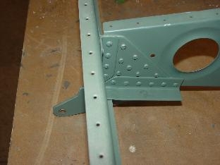 Rivited the flap bracket to the middle rib.