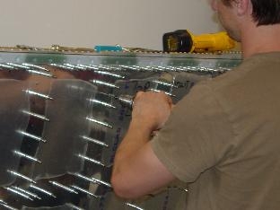 Drilling the top skin on the left wing.
