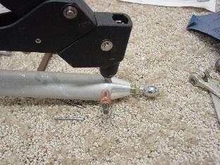Riviting the end on the large push tube.