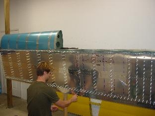 L.J. putting clecoes into the top skins.