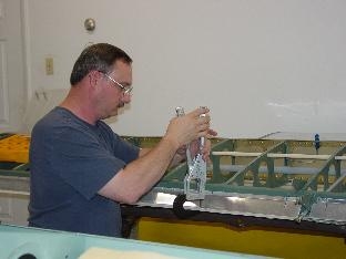 Here I am squeezing a rivit on the airleron gap fairing.