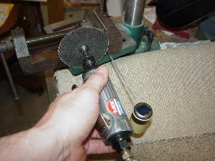 Here I am cutting the float rod to the correct length.