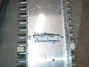 Showes the attach bracket on the back of the baffel.