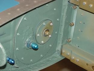 Bolts holdinjg the bracket of the tank to the spar