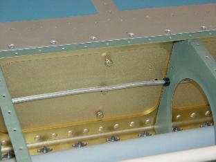 Bolts on the back side of the spar for the fuel tank.