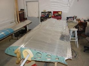 Put the screws in the wing skin .