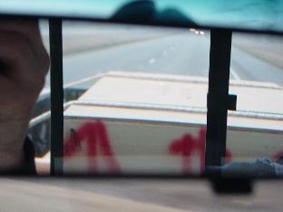 Photo of the boxes riding in the back of the truck.