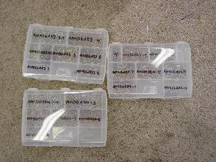 Seperating the smaller parts and putting them into boxes.