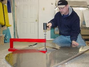 Here I am dimpling the firewall.