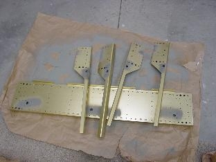 Enlarged snap bushing holes to 5/8 and primed them.