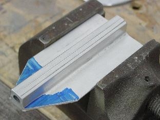 Cutting the angle on the tiedown bar.