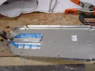 Locating and drilling the bracket onto the 712 bulkhead.