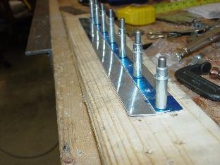 Here I am match drilling the 705L and 705K shim together.