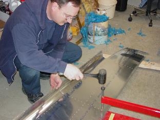 Here I am dimpling  one of the side skins.