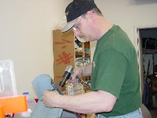 Here I am riviting the bulkheads into the tailcone.