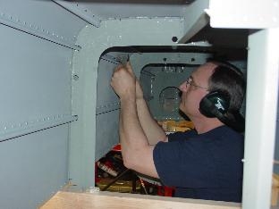 Here I am inside the aft fuselage bucking rivits.
