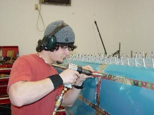 Here is jake on the outside running the rivit gun.
