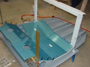 Here I am locating the pan to the seat ribs.