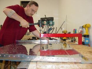 Here I am dimpling the forward lower fuselage skin.