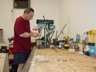 Here I am deburing the rudder pedals.