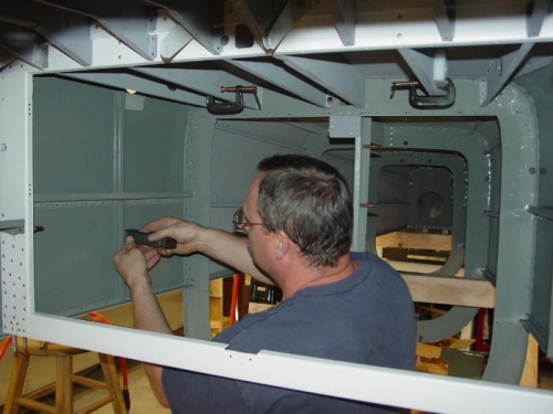 Hewre I am bucking rivits on the inside of the fuselage.