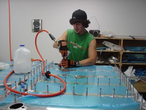 Here Jake is 5riviting the bottom of the forward floor section.