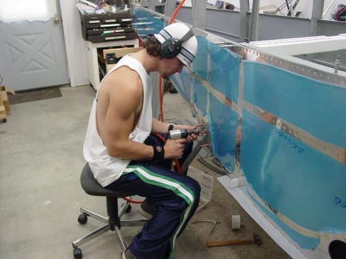 here is Jacob riviting the right side step on.