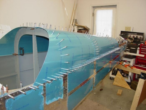 Here I have the fuselage skins clecoed to the sides of the lower fuselage.